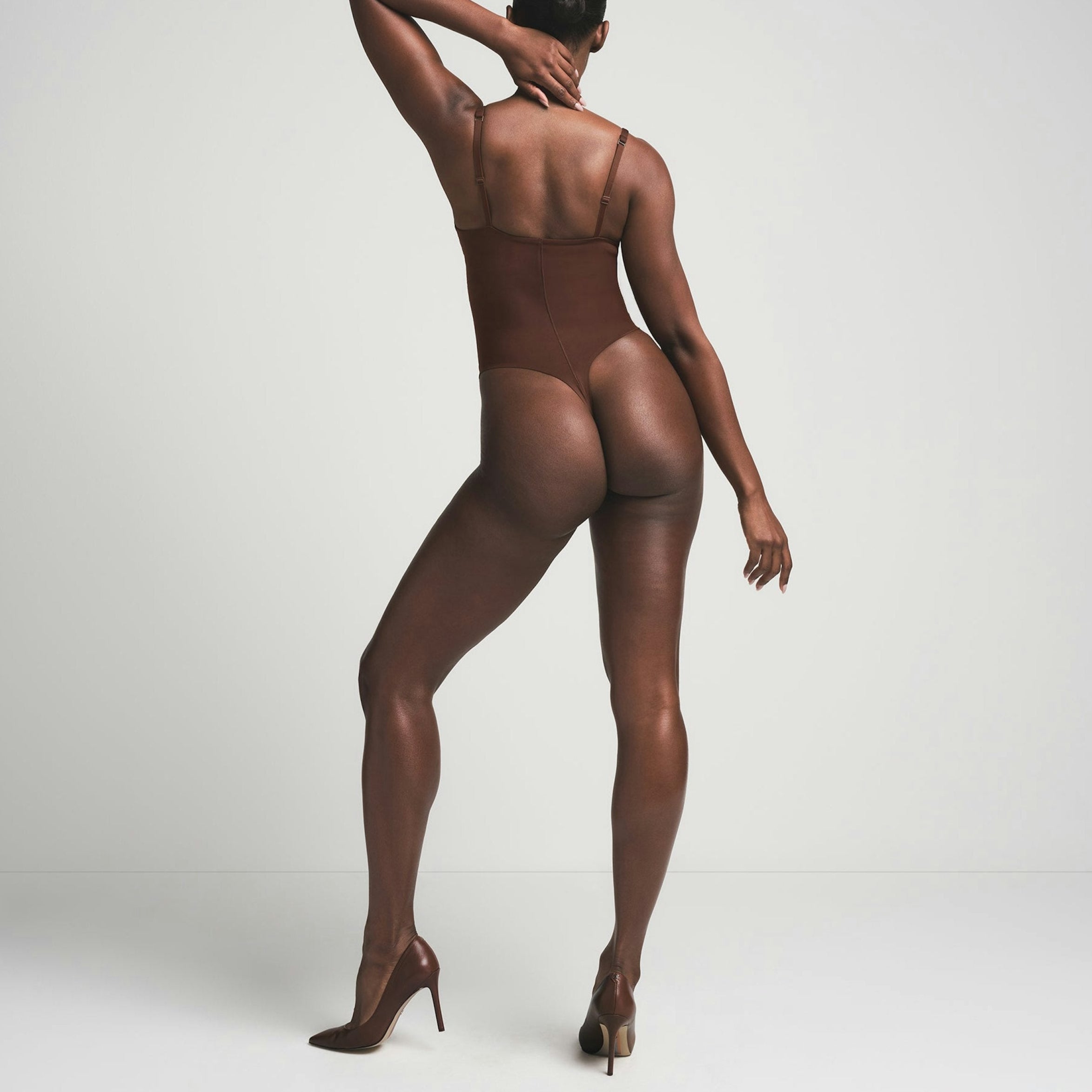 UPFORM — Push-Up Contour Bodysuit